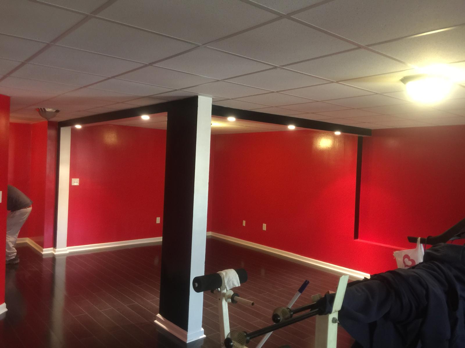 Finished residential room with red walls